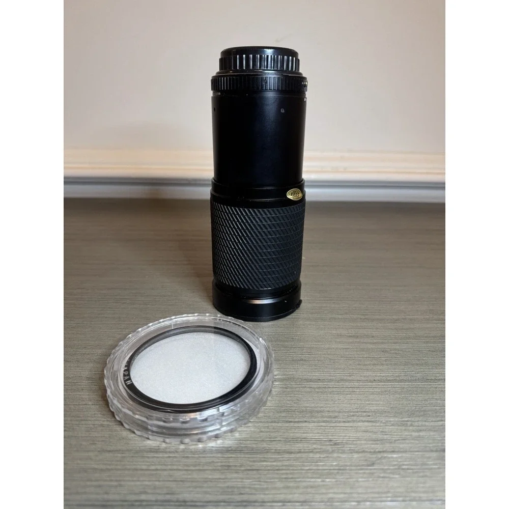 Vintage Tokina SZ-X 28-200mm Manual Focus Zoom Lens Black + 72mm UV Filter